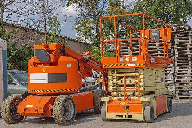 industrial forklift transporting goods in a warehouse setting in Aventura FL